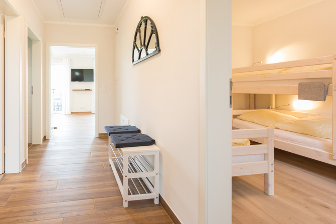 Ferienhaus in Fehmarn OT Gammendorf - Feriendomizil SeeSand - Ansicht Flur und Kinderzimmer Wohnung See