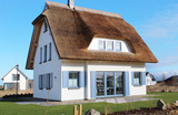 Ferienhaus in Dranske - Ferienhaus Rügenzauber mit Sauna, Kamin & Badewanne - Bild 1